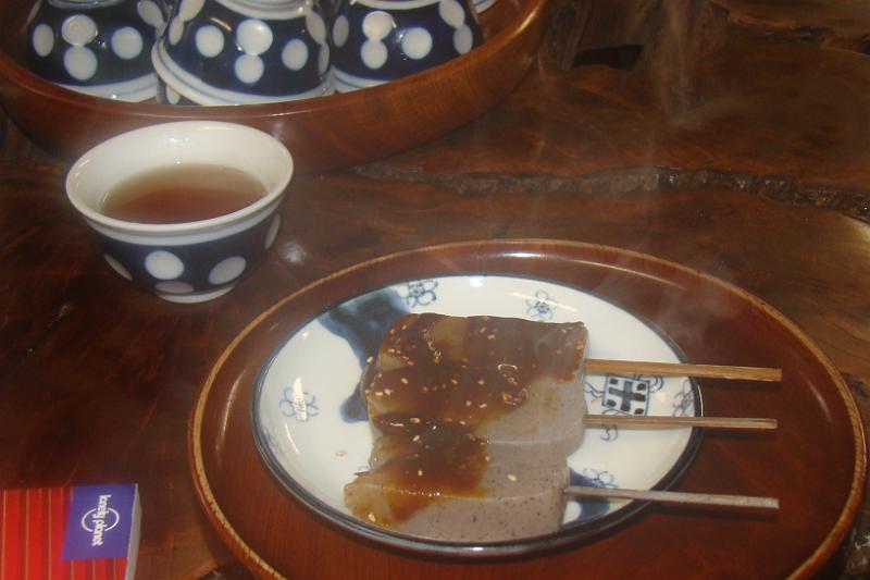 dsc01767.jpg - These were a weird hot jelly snack with thick miso paste - very odd flavour (in other words I didn't like them).  The tea was free though.