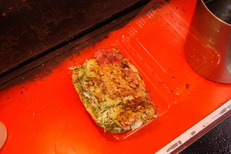 dsc01819.jpg - Okonomiyaki - Japanes Pancake with cabbage - pretty bland until...